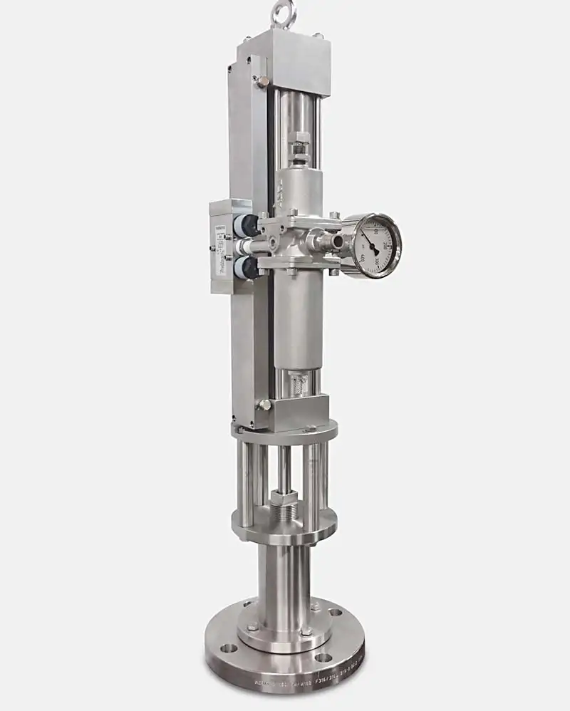 A vertical, industrial stainless-steel apparatus with cylindrical components, gauges, and control valves. Featuring a circular base and a pressure gauge on one side, the device includes a top-head drive pump among its various mechanical parts assembled in an upright configuration against a plain white background.