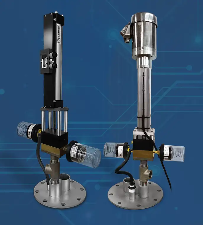 Two industrial devices with stainless steel components and electronic parts are displayed against a blue technical background. Each device features vertical and horizontal elements, tubes, and cables. Both are mounted on circular metal bases.